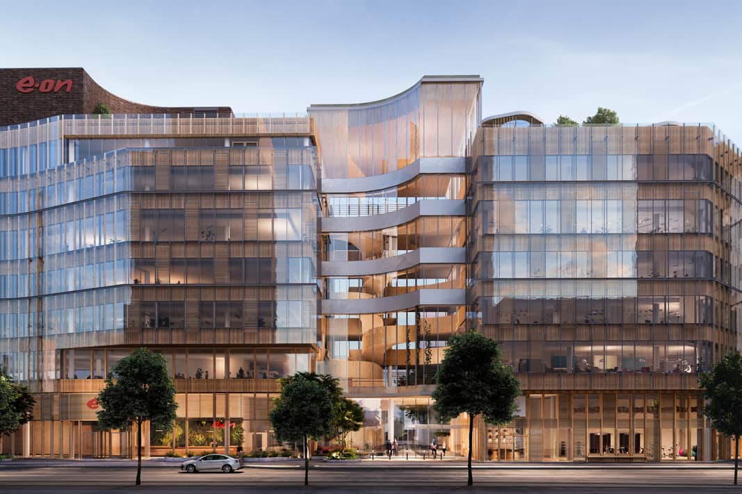 Visionsbild av fasad och entré.