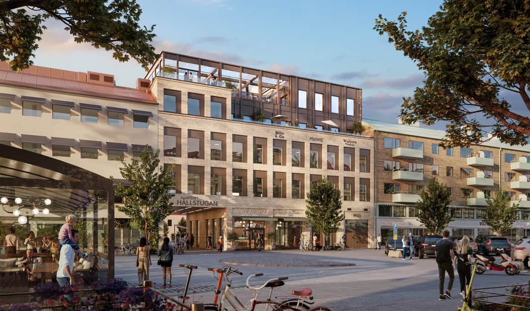 Det nya kontorshuset i ljust tegel med restaurang i botten och takterass högst upp