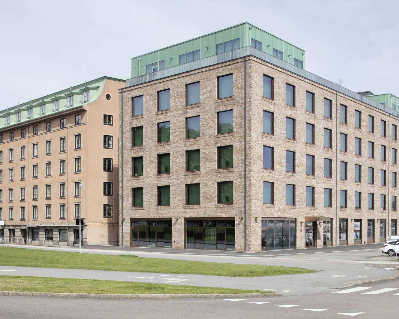 Exteriörbild av den färdigställda fastigheten.