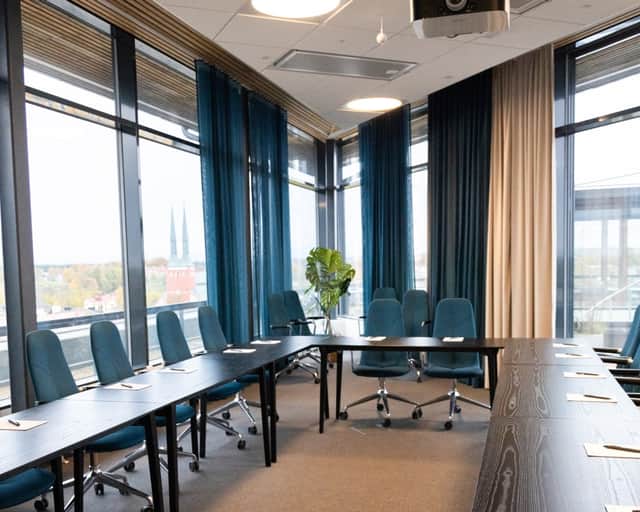 Konferensrum högst upp i huset med möjlighet att gå ut på terassen