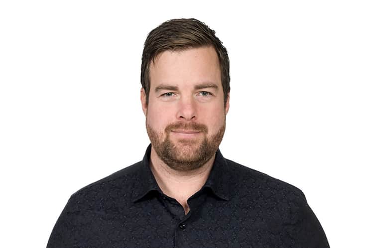 Porträttbild på Charlie Heywood