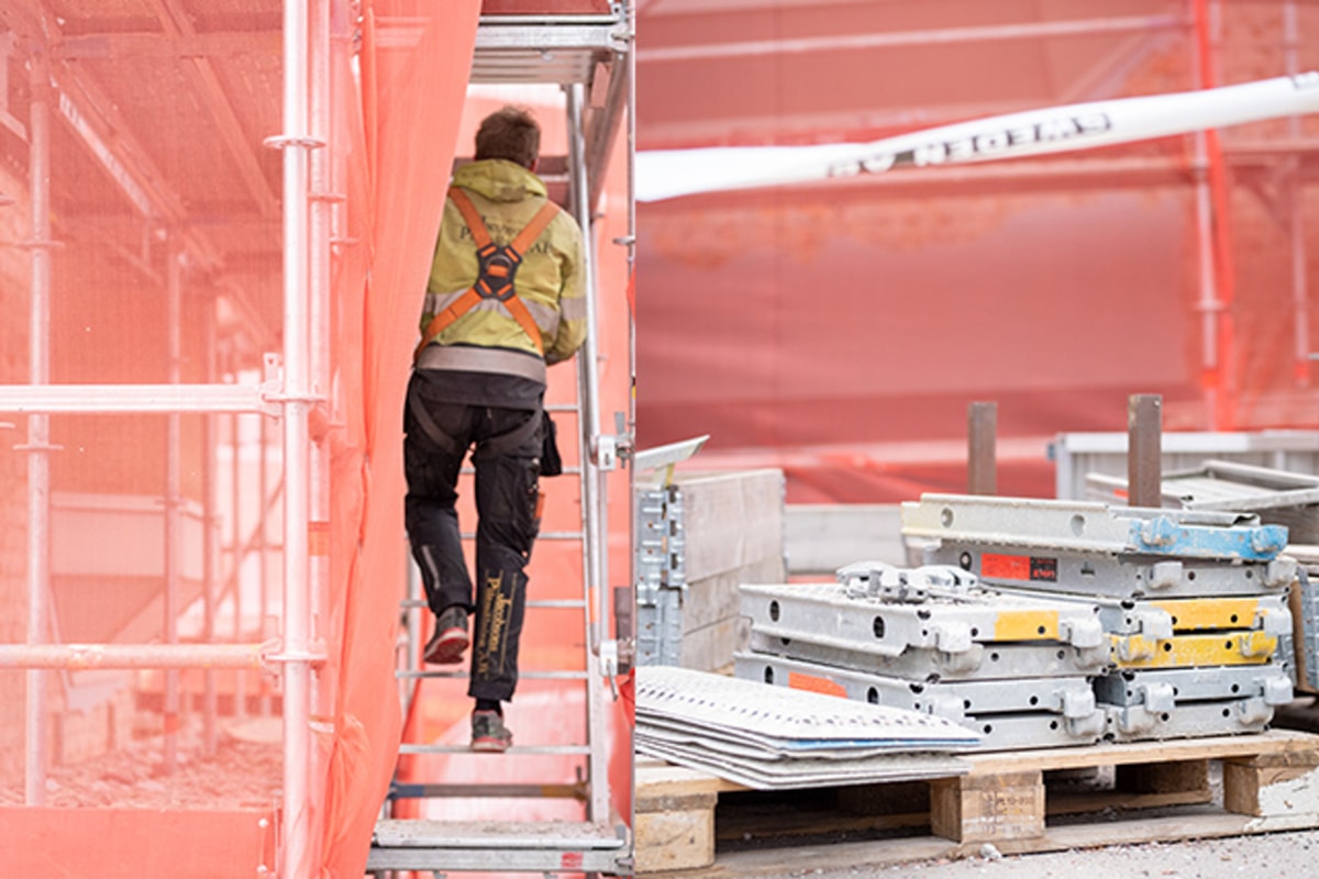 Byggjobbare p&aring; en byggst&auml;llningstrappa.